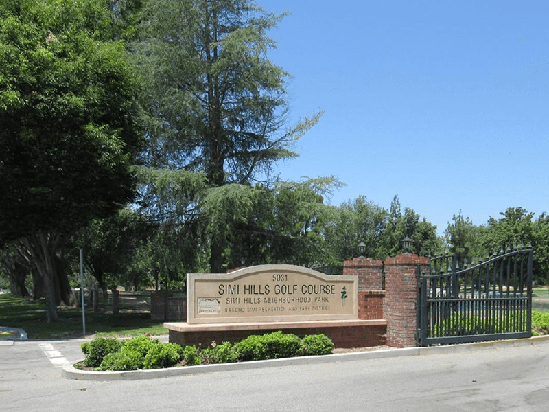 Simi Hills Neighborhood Park sign at the gated entrance of the park