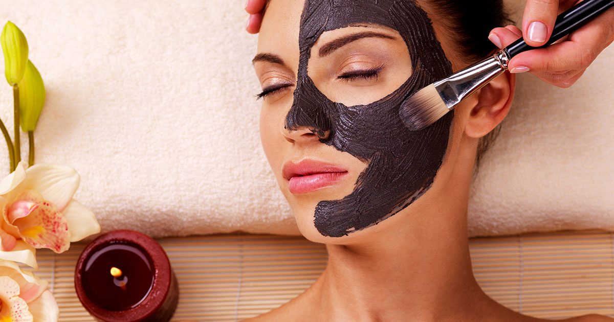 woman getting spa services and a facial