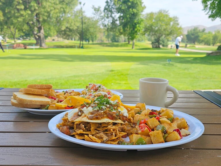 Enjoying a meal at Simi Hills Golf Course with a view of the golf course.