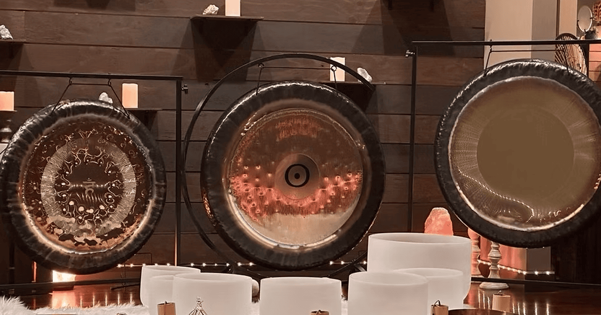 Gong musical instruments display in Simi Valley wellness center for relaxation and meditation.