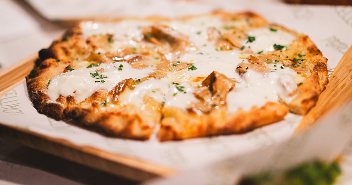 Delicious Margherita pizza with fresh mozzarella, basil, and tomato sauce at Porcellino's, Simi Vall.
