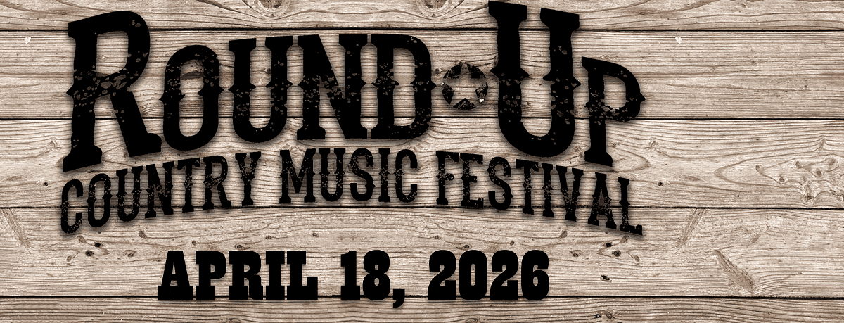 Festival poster with event details and rustic wooden background.
