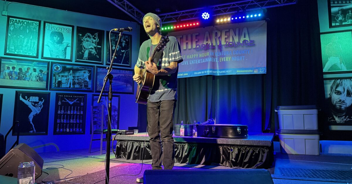 Performer singing on stage during live music event in Simi Valley.