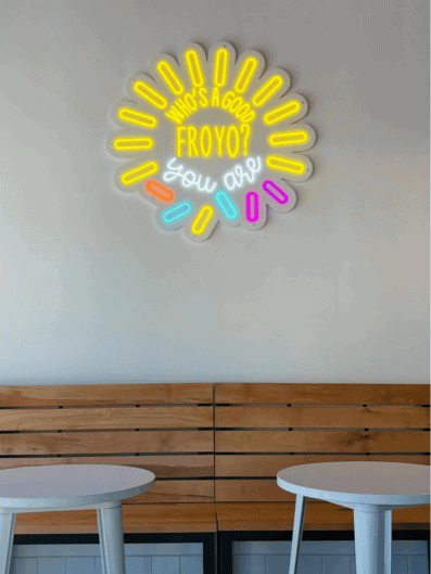 Neon sign reading "What’s a good Froyo?" at Froyo & Fido in Simi Valley.