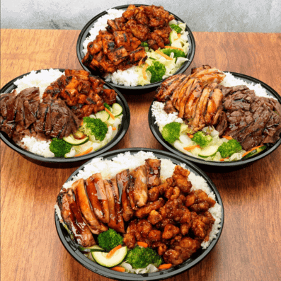 Assorted Teriyaki Madness bowls with rice, vegetables, and grilled meats.